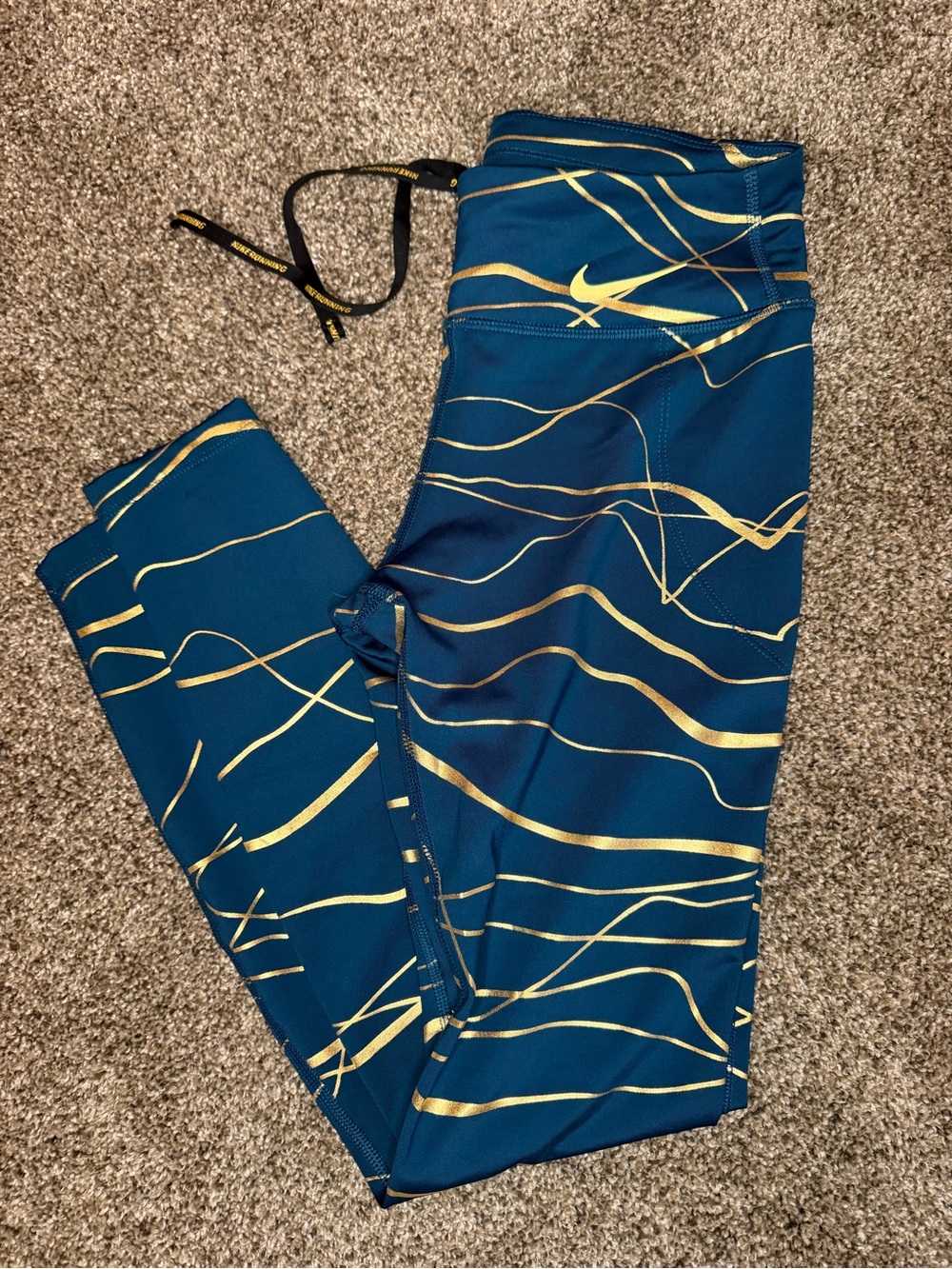 Nike Teal Leggings with Metallic Gold Line Accents